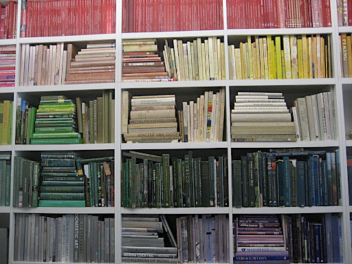 Organizing them this way is so beautiful and makes it easy to pull books for shoots and propping.