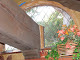 Restoration of copper window, rebuilt using old and mouth blown glass for a private residence in Santa Cruz, CA.