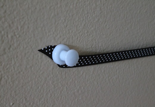 Use GIANT push pins to hold the calendar up