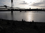 The swimmers in the water off in the distance