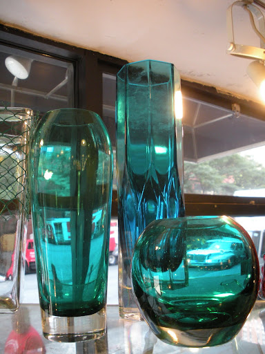 The aqua color of these glass vases gives off the most amazing filter of light.
