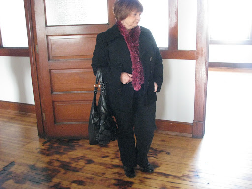 Lin Waterhouse looks at scorch marks from the explosion. (Photo: Emma Wilson)