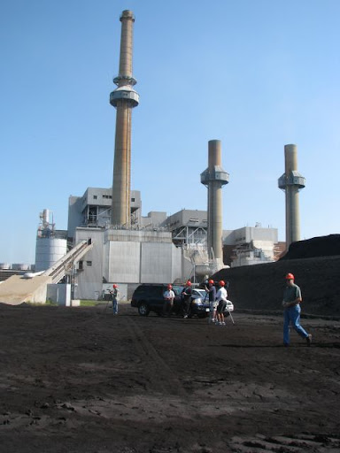 Smokestacks loom over the piles of coal at the James River Power Station southeast of the city limits. (Photo credit: Jennifer Moore)