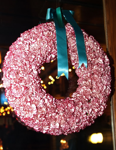 Decorative wreaths hung on the venue’s doors.