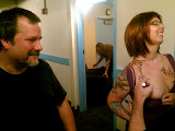 Tim, the stage manager, closing up the show as the boys mess around with the groupie. Tim, the stage manager, closing up the show as the boys mess around with the groupie.