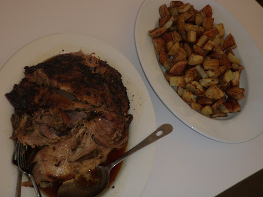 The pork, which cooked low-and-slow for 8 hours (!) and roasted potatoes