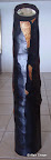 079 - Lumière Noire - 1997<br />
H 110 x 22<br />
Sculpture ébène et feuille d'or