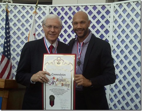 Stephen getting award for foster kid charity