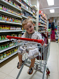 At a supermarket in Kenya: this was Matimu's first time to ride around in a shopping cart like that and he loved it! Madagascar6 - 058.jpg