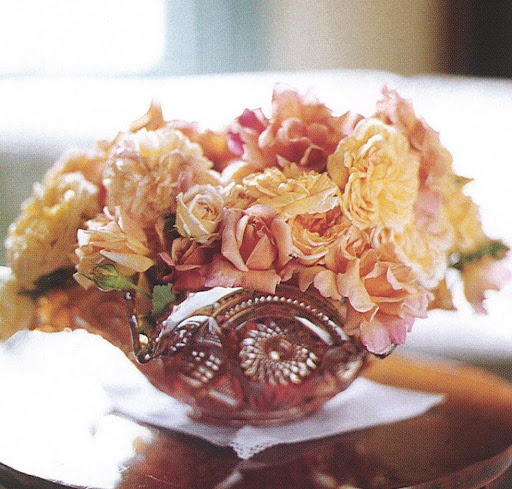 A turn-of-the-century carnival-glass fruit bowl holds a bouquet of pastel roses culled from Martha's garden, at once cradling the blossoms and letting them sprawl. (The Best of Martha Stewart Living -- Arranging Flowers) A turn-of-the-century carnival-glass fruit bowl holds a bouquet of pastel roses culled from Martha's garden, at once cradling the blossoms and letting them sprawl. (The Best of Martha Stewart Living -- Arranging Flowers)