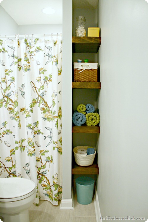 wood shelves in bathroom @ simplehomeinteriordesign.com