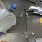On the left is my fuel filter. My friend gave it to me, but it came without a mount bracket. No problem!
