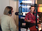 Chefs Wylie Dufresne and Hugh Acheson discussing culinary techniques.