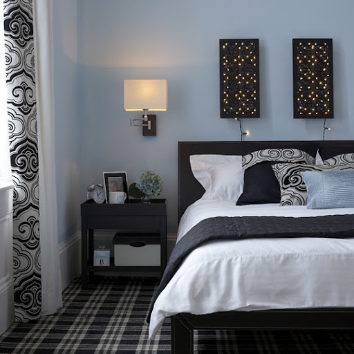 I like seeing tartan rugs fill an entire room.