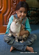 During the week of intense fighting in May 2010, residents were too afraid to get out of the house to get food. Hind survived it on dried salted fish and a lot of water.