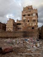 Trash pile in front of Sana'a Nights hotel. Sana'a, Yemen