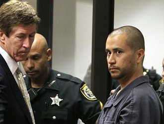 Reuters US George Zimmerman in court w lawyer 20Apr12 480