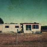"Mississippi River Mobile Home/Oquawka, Illinois" - copyright Jane Carlson