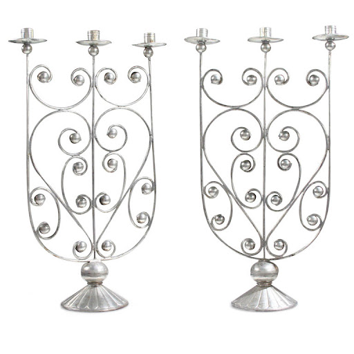 Ornate candlestick holders would make stunning centerpieces. (1stdibbs.com)