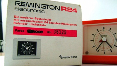 Remington R24 Sperry Rand battery operated orange plastic clock