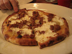 Pizza di mortadela:  shaved mortadela, honey, goat's cheese and onions