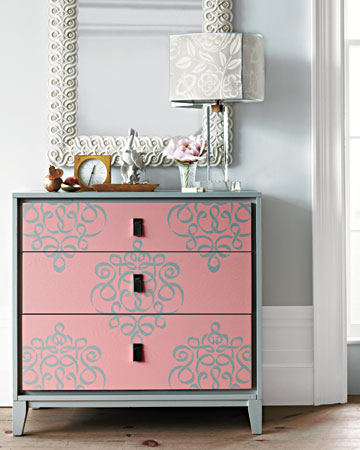 Unexpected pairings often have stunning results. With a stenciled damask pattern, a basic bureau takes a glamorous turn, while a wallpaper-covered shade gives the lamp a bold new glow. Unexpected pairings often have stunning results. With a stenciled damask pattern, a basic bureau takes a glamorous turn, while a wallpaper-covered shade gives the lamp a bold new glow.
