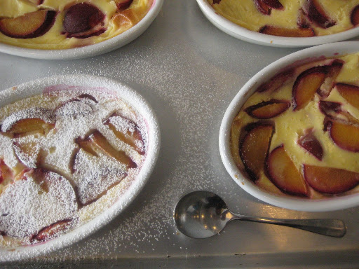 Plums were originally the third fruit in our dessert issue. In the final version, these clafouti were made with peaches. Plums were originally the third fruit in our dessert issue. In the final version, these clafouti were made with peaches.