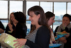The guest of honor opening gifts.