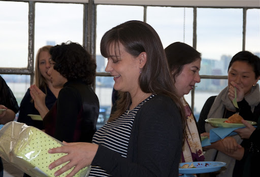 The guest of honor opening gifts.