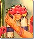Sita holding victory garland