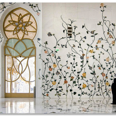 A view of the entrance hall of the Sheikh Zayed Bin Sultan Al Nahyan Mosque in Abu Dhabi. Named after the founder and first president of the UAE, the mosque is also known as the Sheikh Zayed Mosque or Grand Mosque and is the largest mosque in the UAE. Officially opened in 2007, it can accomodate for up to 40,000 worshippers and holds a few world records such as the largest carpet (5,627m2 / 60,570 sq ft), the largest chandelier, (10m in diameter and 15m height), or the biggest number of domes (57 domes). Mostly made of white marble and was decorated using various materials such as marble, stone, gold, semi-precious stones, crystals and ceramics, the Sheikh Zayed Mosque is possibly the most imposing religious and national landmark in Abu Dhabi, as well as one of the most important, and beautiful, architectural treasures of the UAE.Visit my smugmug...Visit my photobox... (for UK and EU printing services)<br> © Philippe Stenier<br>Photo selected by <a href="http://bitofinspiratio 4282618410.jpg