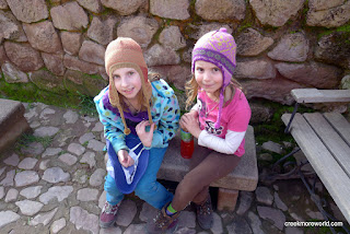 Score!  We all get great gifts including these awesome alpaca hats and a beautiful tapestry for our house.