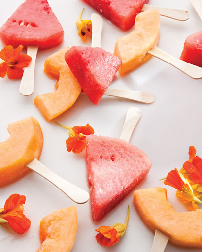 Margarita soaked melon wedge popsicles make you feel grown-up and kid-like at the same time. (marthastewart.com) Margarita soaked melon wedge popsicles make you feel grown-up and kid-like at the same time. (marthastewart.com)