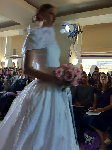 Here's one of her strapless silk jacquard gowns.