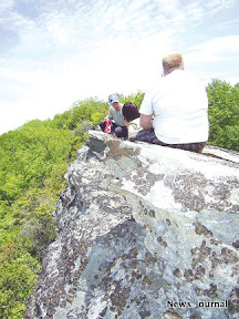 Hikers sitting on big rock 2x.jpg
