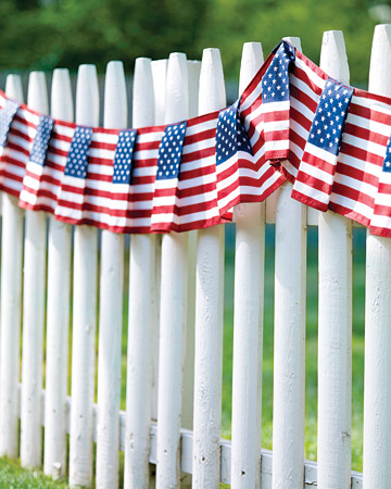 Two American classics: White Picket fence and the flag. (marthastewart.com/271536/flag-patterned-fence-swag) Two American classics: White Picket fence and the flag. (marthastewart.com/271536/flag-patterned-fence-swag)