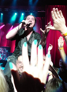 Hands.  Trish's are the ones with nail polish.