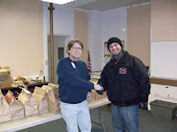 KCII's General Manager Joe Nichols delivering food at HACAP