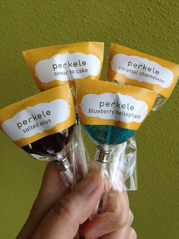 This Charming Candy lollipops with custom labels for a Regretsy event