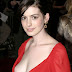 06/19/2006 - Anne Hathaway - The Devil Wears Prada New York Premiere - Arrivals - AMC Loews Lincoln Square - New York, NY - Keywords: - - - Photo Credit: Anthony G. Moore / Photorazzi - Contact (1-866-551-7827) anne-hathaway-sey-red-shirt-and-gold-earrings.jpg