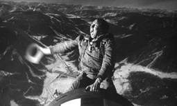 c0 NF Slim Pickens riding a nuclear bomb in Dr Strangelove.