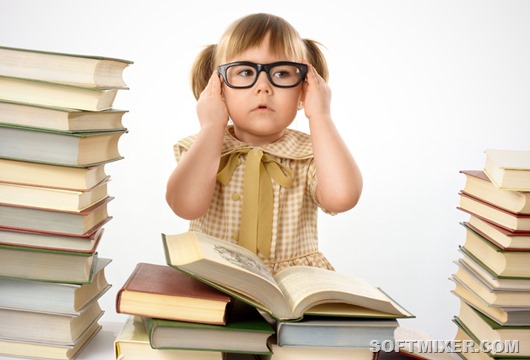 Little girl with books wearing glasses
