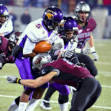 Donny Lisowski gets his head on the ball while making a tackle.