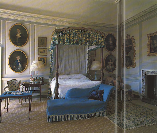 The Duchess' bedroom at Badminton. Her personality and presence can be felt in the design: a games table; a favorite chaise longue and a large arm chair with rugs thrown over it for the dog.