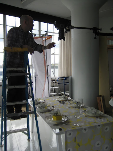 Patrick preps the overhead shot of the table.