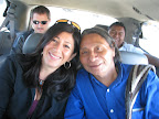 Amazon Watch ED Atossa Soltani with Berito Cobaría, upon arrival in San Francisco. From U'wa territory in northeastern Colombia, the U'wa had to travel 14 hours by bus, lay-over in Bogotá to receive their visas, and then travel another 12 hours by plane.