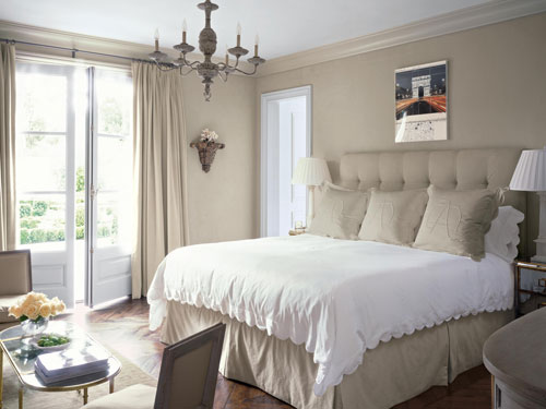 Upholstered walls are ultra-chic and provide comfort, warmth and insulation from the outside world. Image from Veranda magazine.