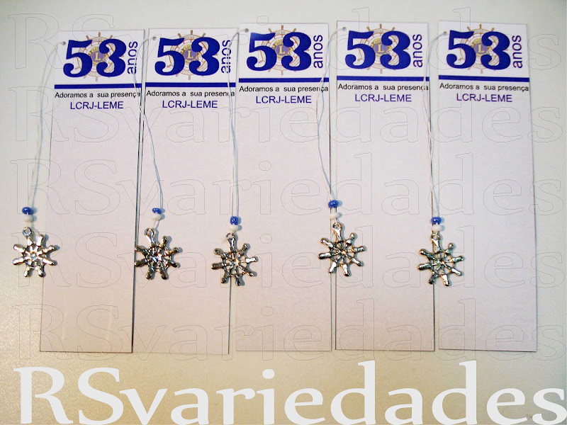 Marcador de livro: Simples R$1,20 unid / cento R$100,00.: Com pingente de coração e continhas coloridas R$2,40 unid / cento R$220,00.: Min. 40 unids para ambas as opções.: Medidas - 4x14 cm.: Impresso em papel cartão 240 grs.