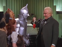 c0 The Wizard gives the Tin Man a heart in the Wizard of Oz.
