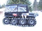 They had a very cool eight-wheeled vehicle called an Argo.  www.argoatv.com  Franny, don't you just love the enormous treads on this thing?  I bet we could travel just about anywhere.